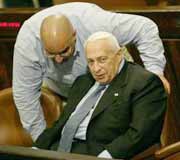 PM Sharon and his som Omri, his chief strong-arm perpetrator